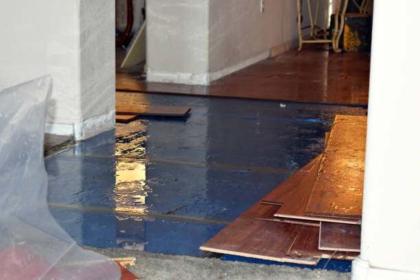 Professional Flood Damage Restoration technician working in West Hills, NY